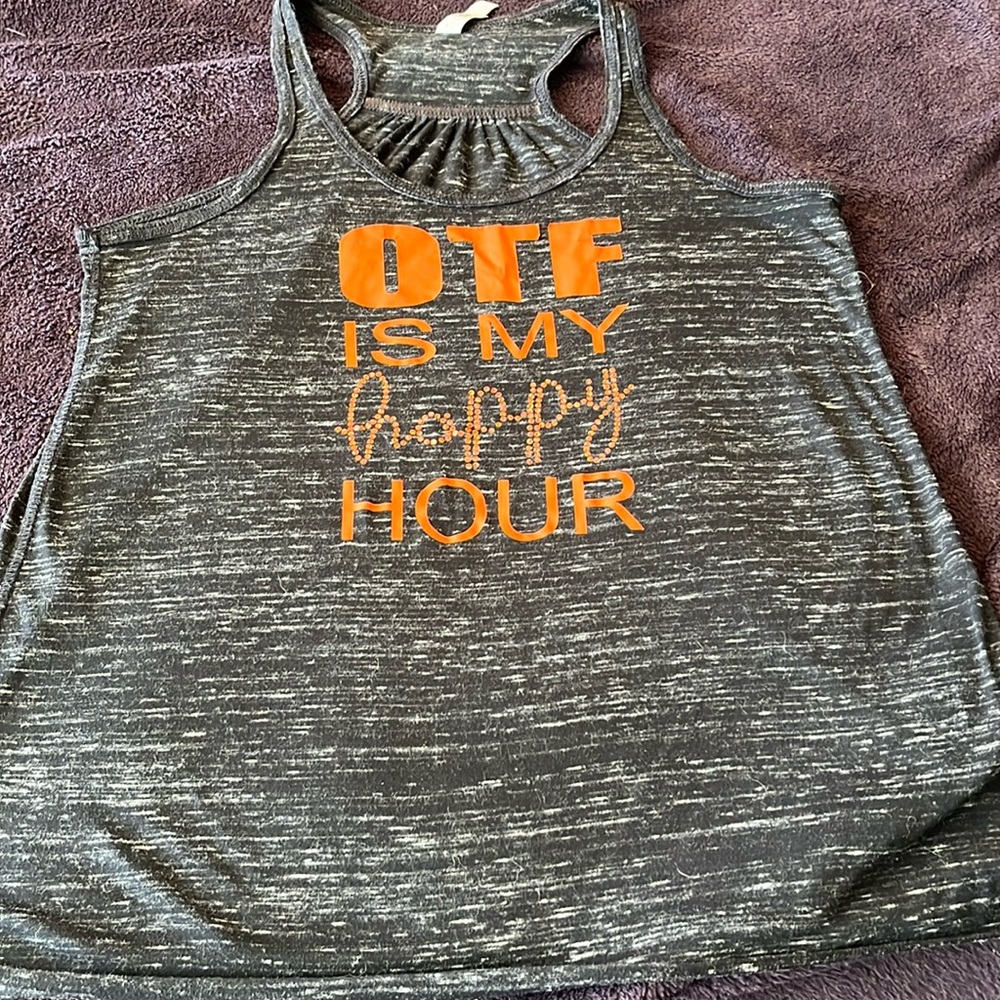 Orangetheory OTF is my Happy Hour black marble size medium Bella canvas tank.